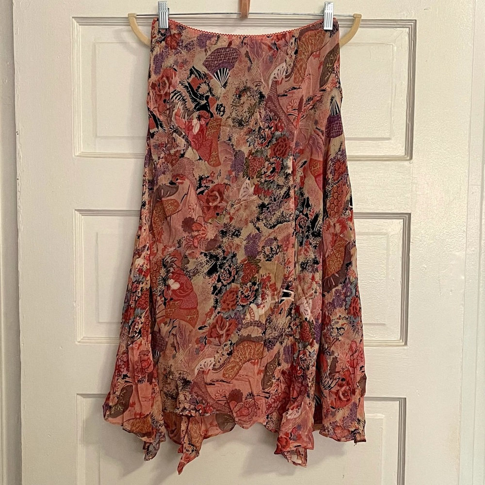 Oriental print hankerchief flowing skirt.